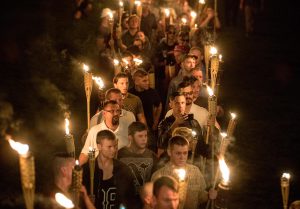 Chanting “White lives matter!” “You will not replace us!” and “Jews will not replace us!” several hundred white nationalists and white supremacists marched in Charlottesville, VA in August 2017. Photo: Washington Post.