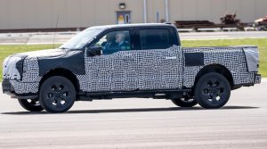 President Biden driving a disguised electric F-150 truck at Ford's Electric Vehicle Center on May 18. Photo: Doug Mills, The New York Times.